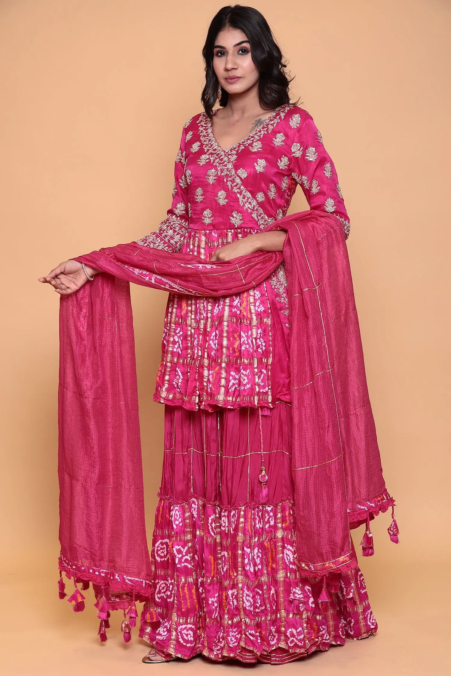 Bandhej ghatchola peplum kurta with skirt and zardozi embroidery.